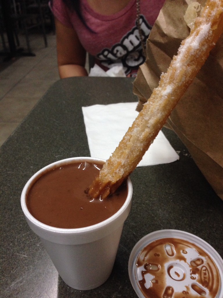 Chocolate-dipped churro from La Palma Cafeteria Miami sports teams travel guide
