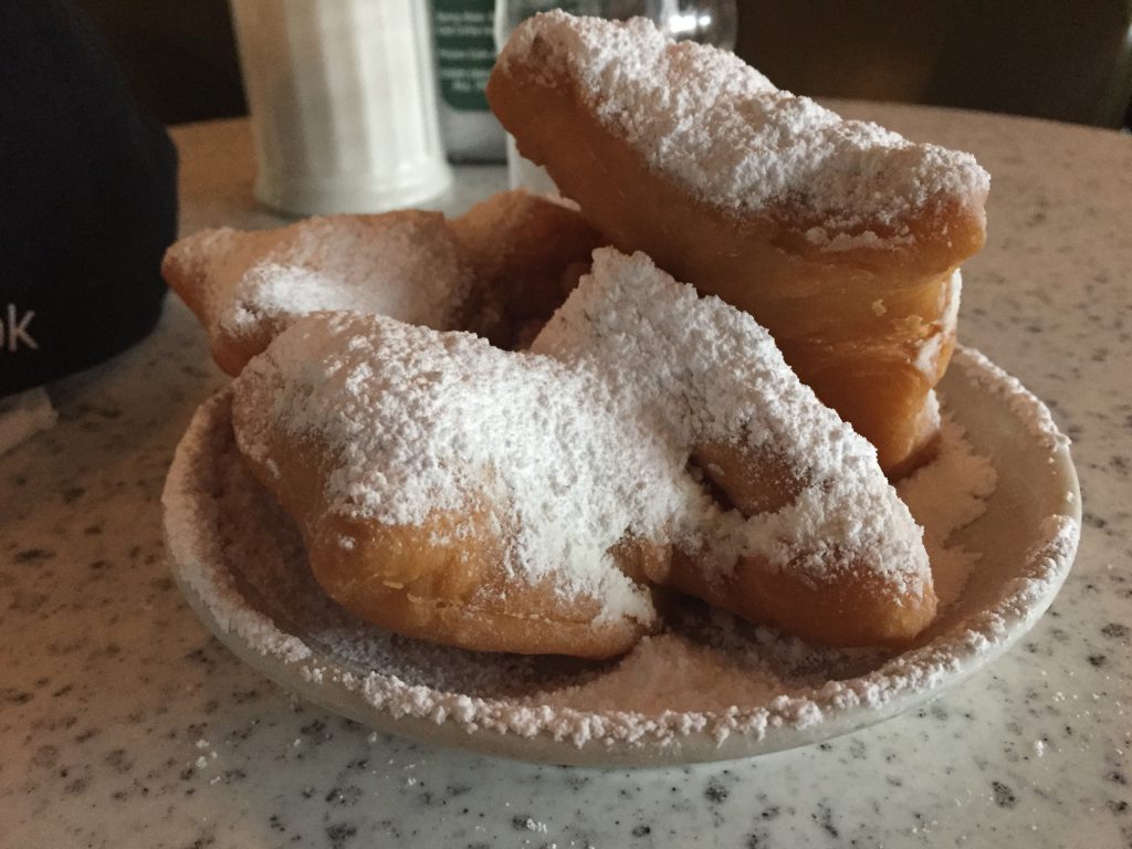 Beignets from Cafe du Monde New Orleans sports teams travel guide