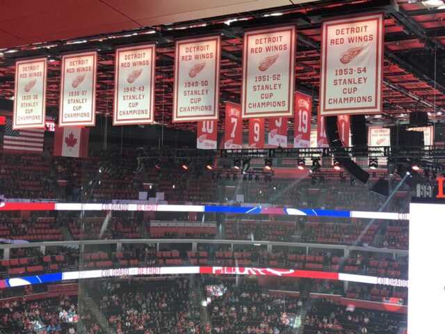 Detroit Red Wings banners hang from the rafters at Little Caesars Arena