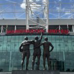 The Trinity statue in front of Old Trafford, the home ground of Manchester United