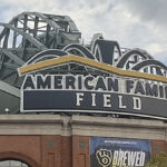 Signage above the home plate gate at American Family Field in Milwaukee