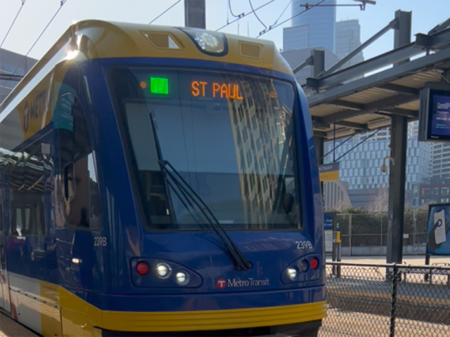 A Metro Transit light rail train pulls up to Stadium station in Minneapolis.