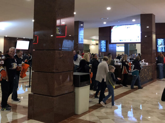 Fans walk along the concourse at Honda Center before an Anaheim Ducks game
