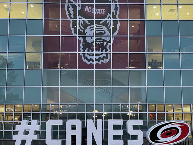 Carolina Hurricanes and NC State Wolfpack logos are seen outside Lenovo Center in Raleigh, North Carolina