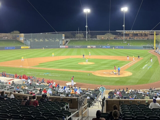 A baseball game is played at night at Salt River Fields at Talking Stick in Scottsdale, Arizona