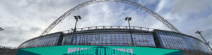 Panoramic view of the distinctive arch spanning above Wembley Stadium in London