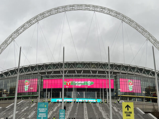 A dramatic staircase leads to the main entrance at Wembley Stadium in London