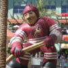A large inflatable Arizona Coyotes player is seen outside the Westgate Entertainment District