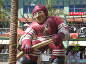 A large inflatable Arizona Coyotes player is seen outside the Westgate Entertainment District