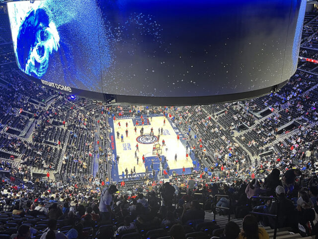View of the oculus board and court inside the Intuit Dome arena in Inglewood, California
