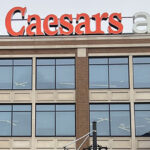 Signage posted atop the east side of Little Caesars Arena in Detroit