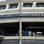 Exterior signage above the home-plate entrance to Steinbrenner Field in Tampa, Florida