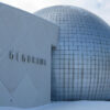 A distinctive silver globe fronts the Basketball Hall of Fame building in Springfield, Massachusetts