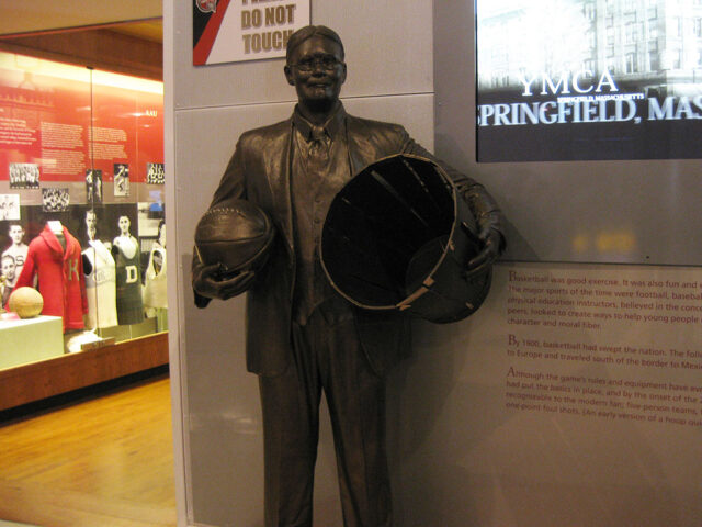A statue of James Naismith stands inside the Basketball Hall of Fame in Springfield, Massachusetts