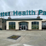 Signage at the home plate entrance to Sutter Health Park, a baseball stadium in West Sacramento, California