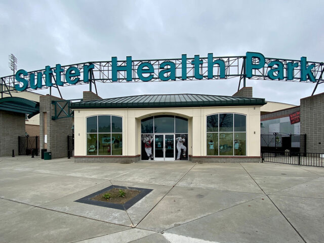 Signage at the home plate entrance to Sutter Health Park, a baseball stadium in West Sacramento, California
