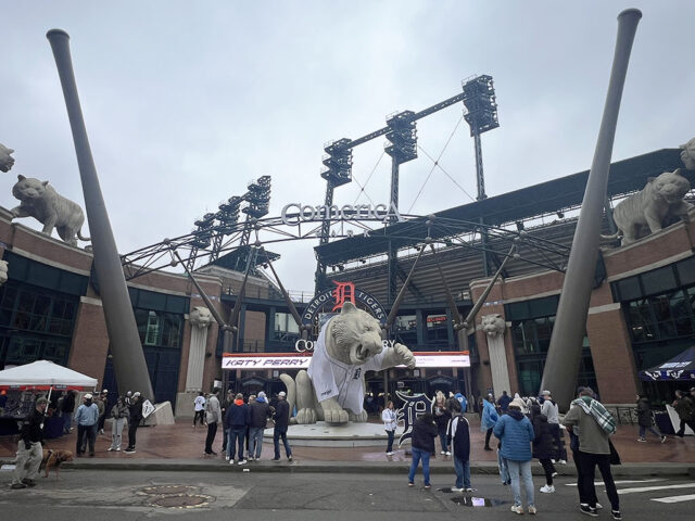A large tiger statue stands in front of the third base gate at Comerica Park in Detroit