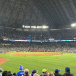 Fans look out onto the field from the right-field standing terrace at Rogers Centre in Toronto