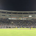 The field at Steinbrenner Field during a Tampa Bay Rays game, as seen from the right-center field concourse