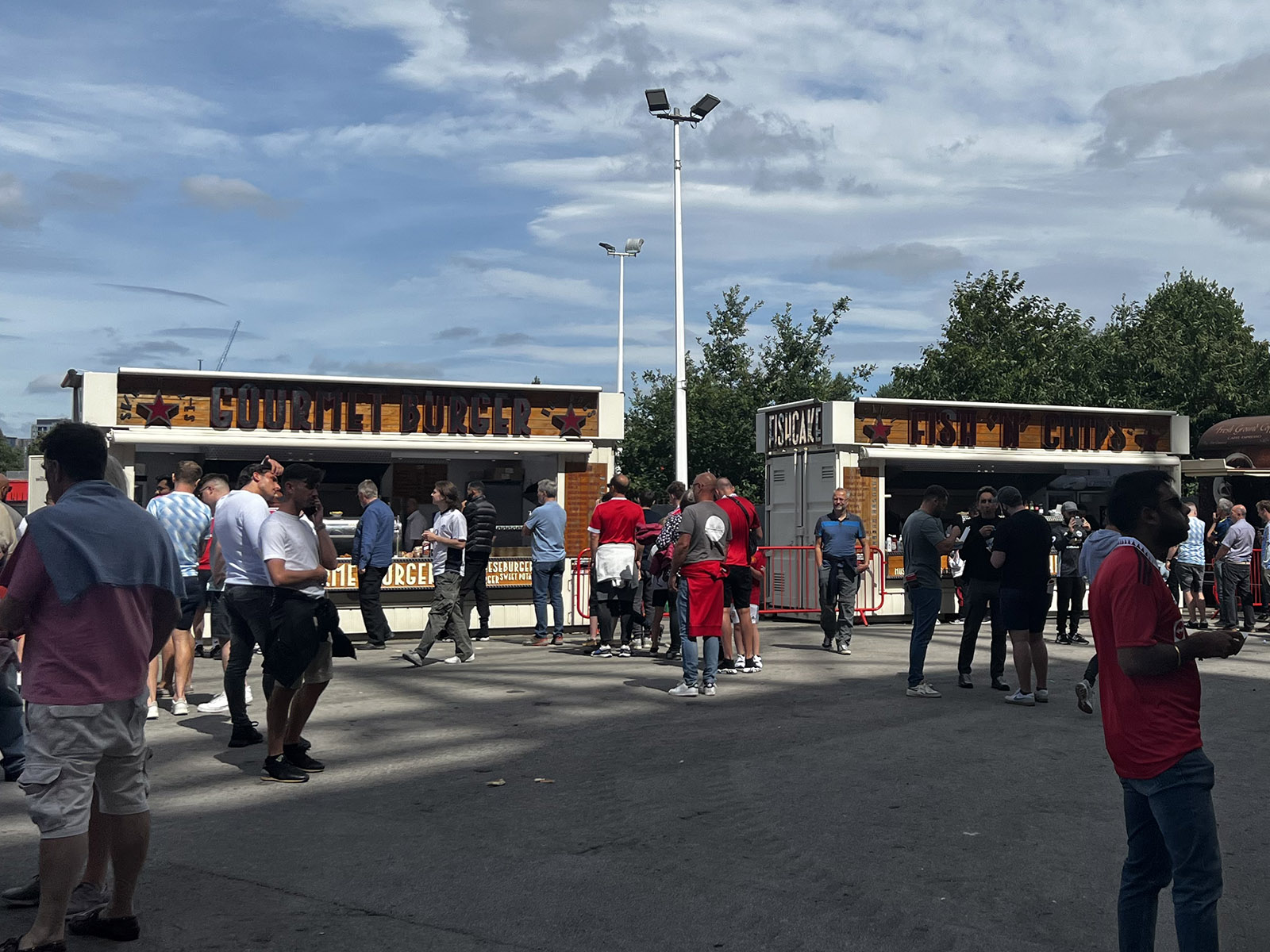 Food stands line the perimeter of Old Trafford stadium in Manchester, England