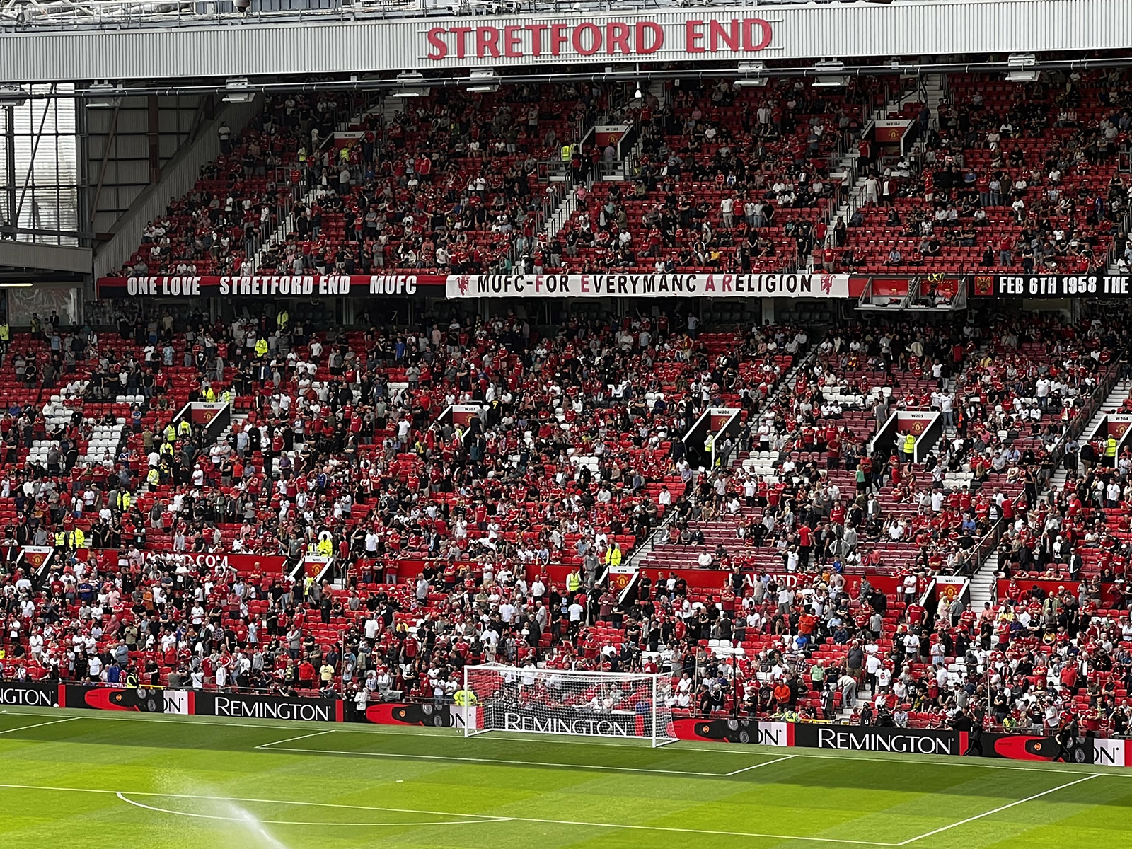 Fans fill the Stretford End stand at Old Trafford before a Manchester United football game