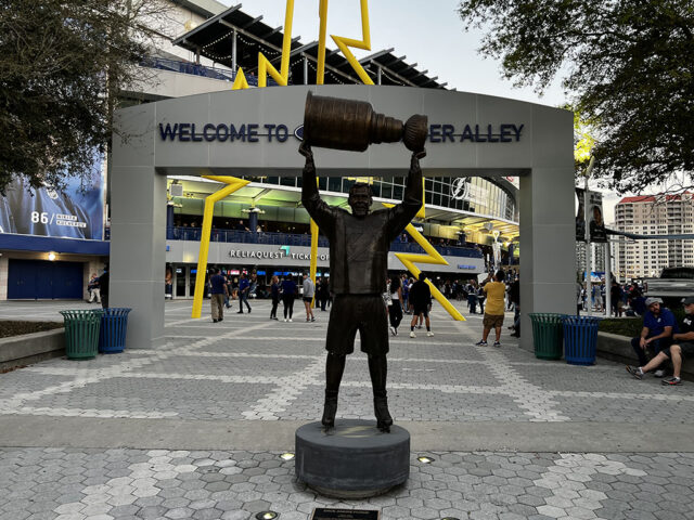 A statue of former Tampa Bay Lightning captain Dave Andreychuk stands in front of the entrance to Benchmark International Arena