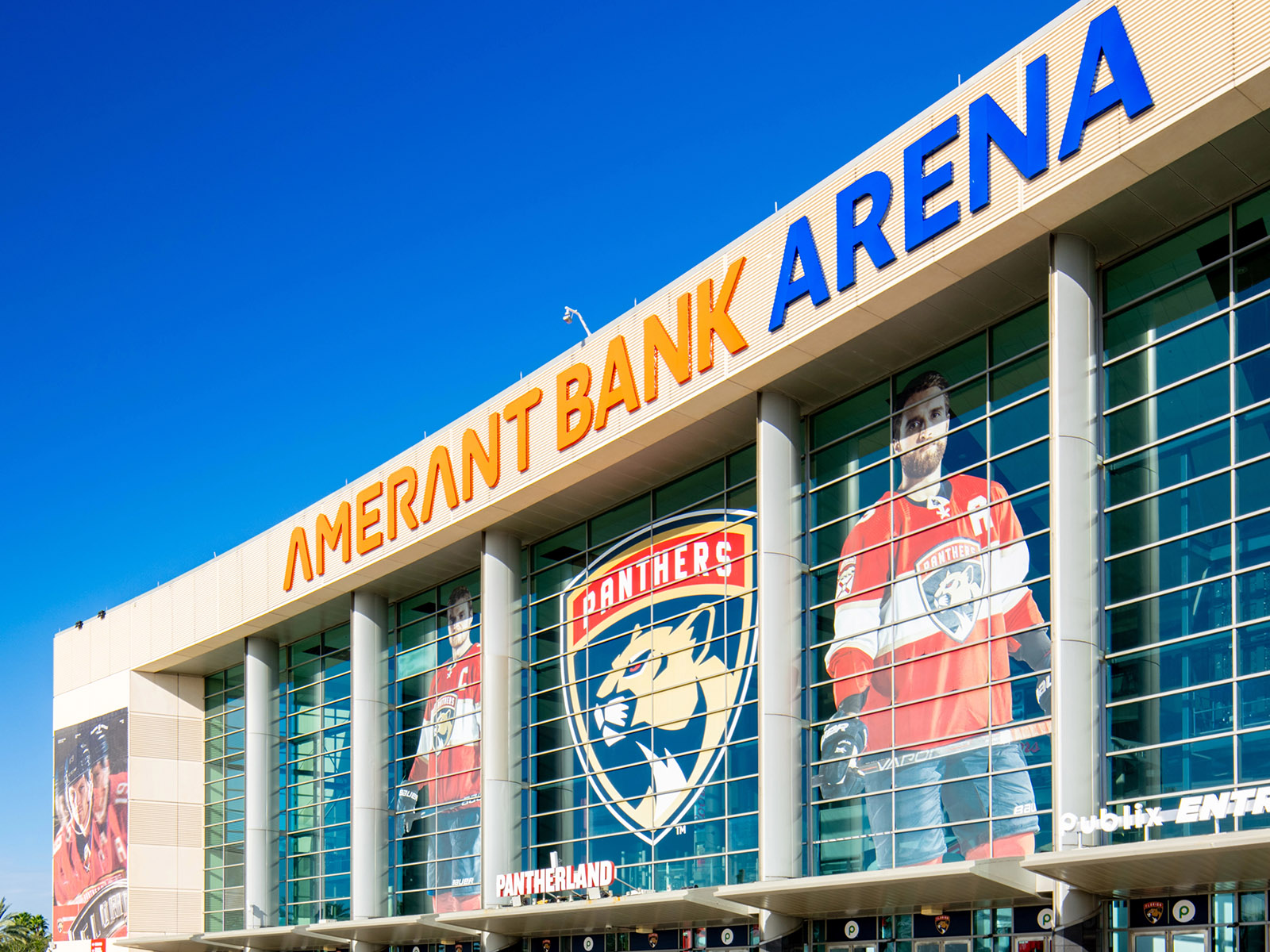 The Florida Panthers logo is displayed prominently on the exterior of Amerant Bank Arena in Sunrise, Florida