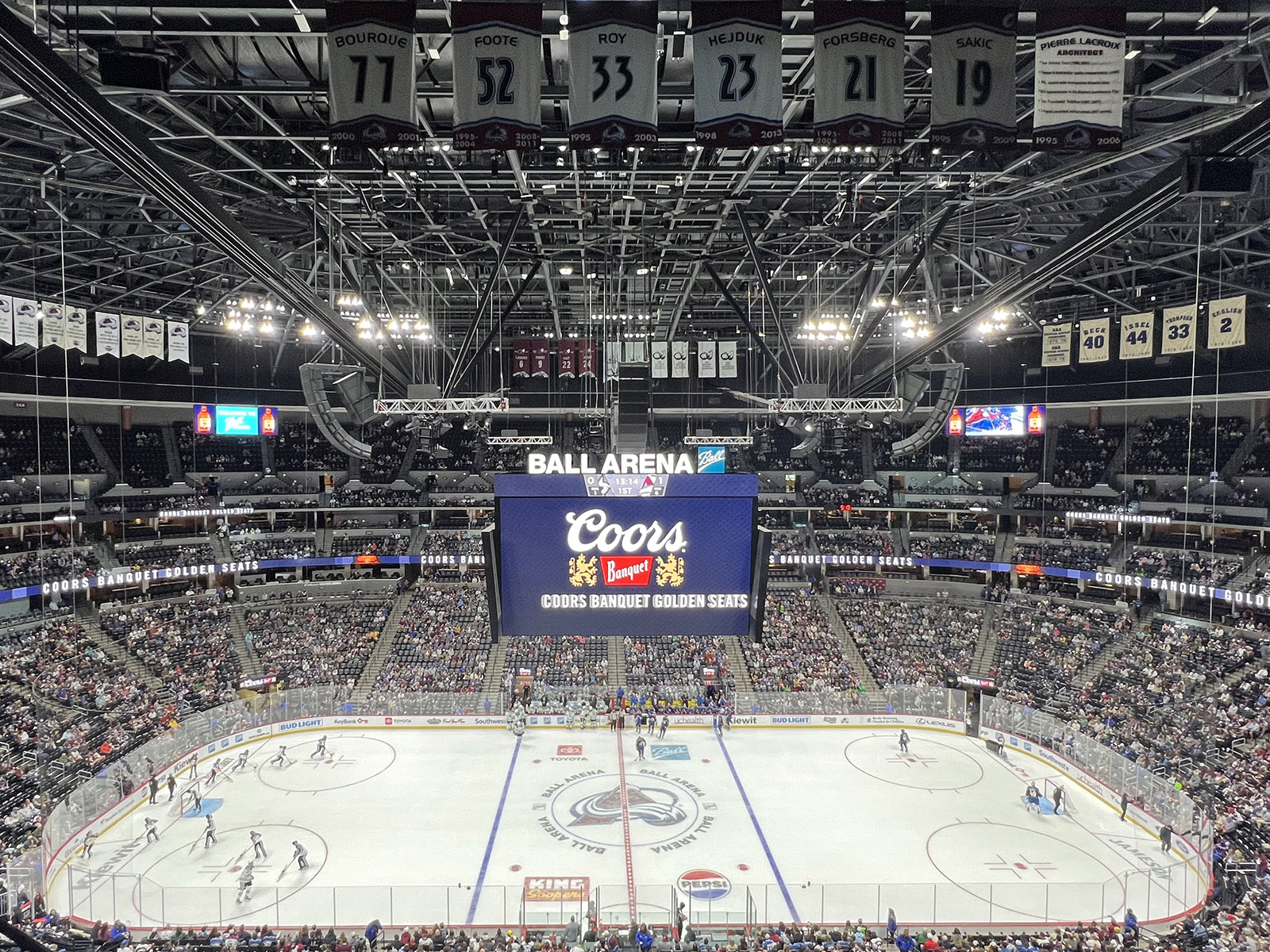 View of the rink and seating bowl at Ball Arena in Denver, Colorado, during an Avalanche hockey game