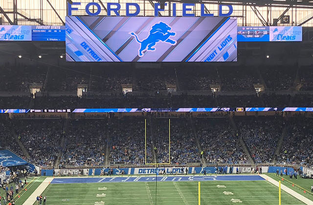 View of the field and seating bowl at Ford Field in Detroit, Michigan, during a Lions football game
