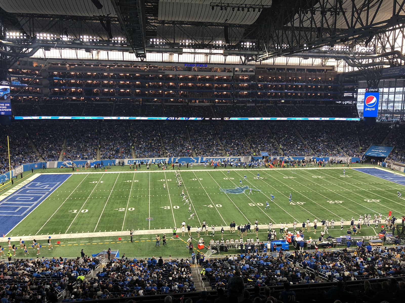 Players line up on the field during a Lions football game at Ford Field in Detroit, Michigan
