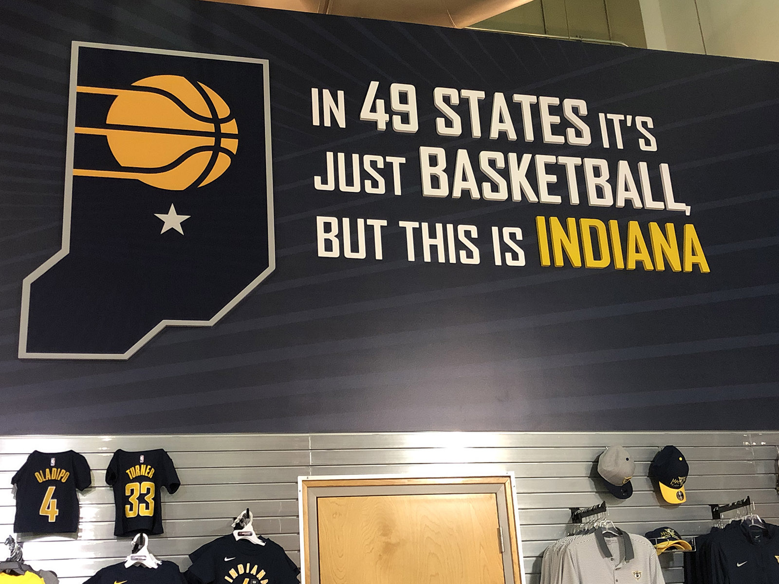 A sign denoting basketball's importance in Indiana is displayed at Gainbridge Fieldhouse in Indianapolis