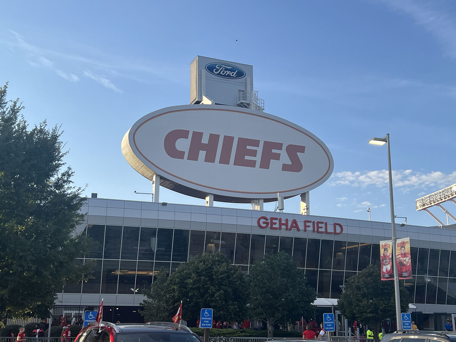 The back of one of the main scoreboards looms over the east entrance gate at GEHA Field at Arrowhead Stadium