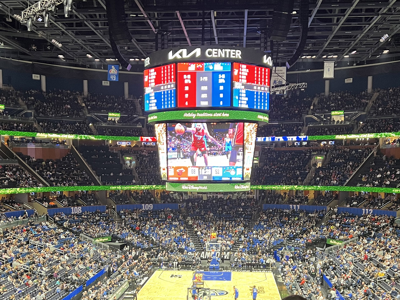View of the center-hung videoboard and court at Kia Center in Orlando, Florida, during a Magic basketball game