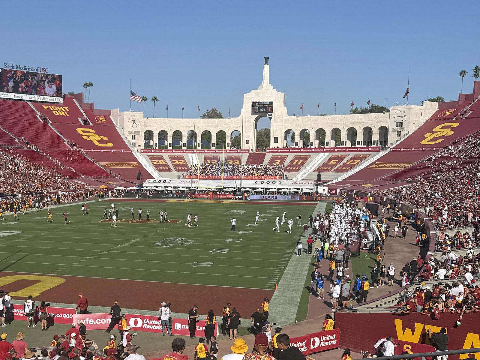 View of the field, including the historic peristyle, from the west end of the seating bowl at the Los Angeles Memorial Coliseum during a USC Trojans football game