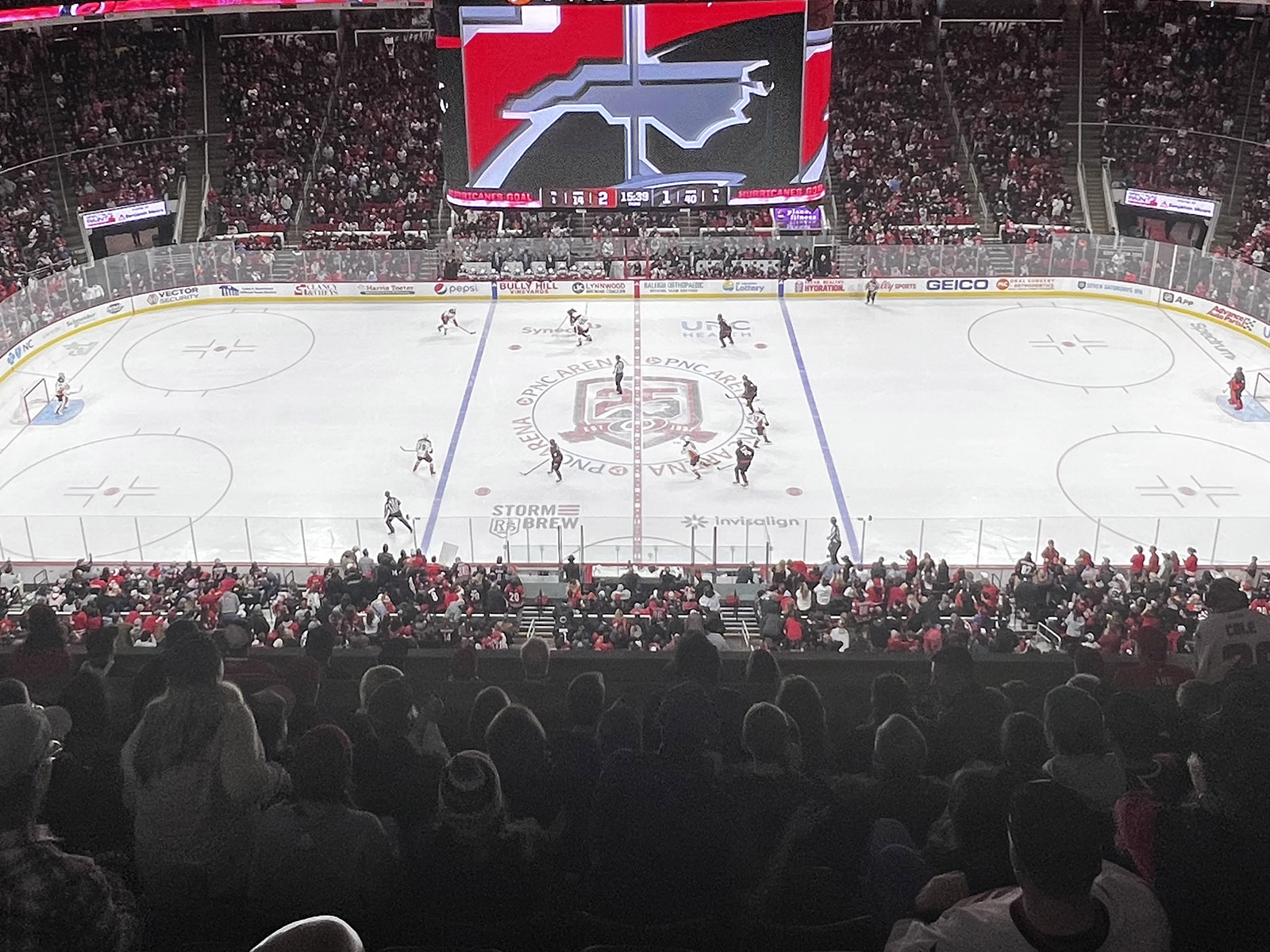 Players line up on the ice during a Hurricanes hockey game at Lenovo Center in Raleigh, North Carolina