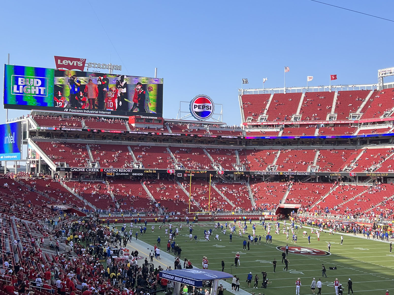 Players warm up on the field before a San Francisco 49ers game at Levi's Stadium in Santa Clara, California