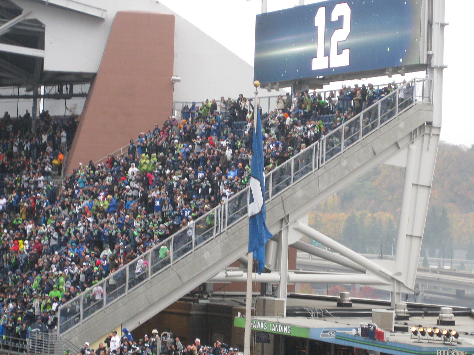 The Seahawks' 12th Man flag flies from Hawks Landing at Lumen Field in Seattle, Washington
