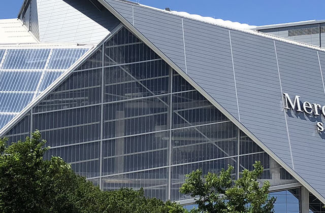 Exterior view from afar of Mercedes-Benz Stadium in Atlanta, Georgia