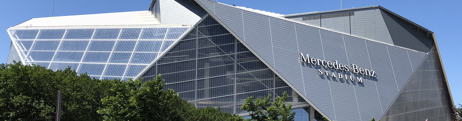 Exterior view from afar of Mercedes-Benz Stadium in Atlanta, Georgia