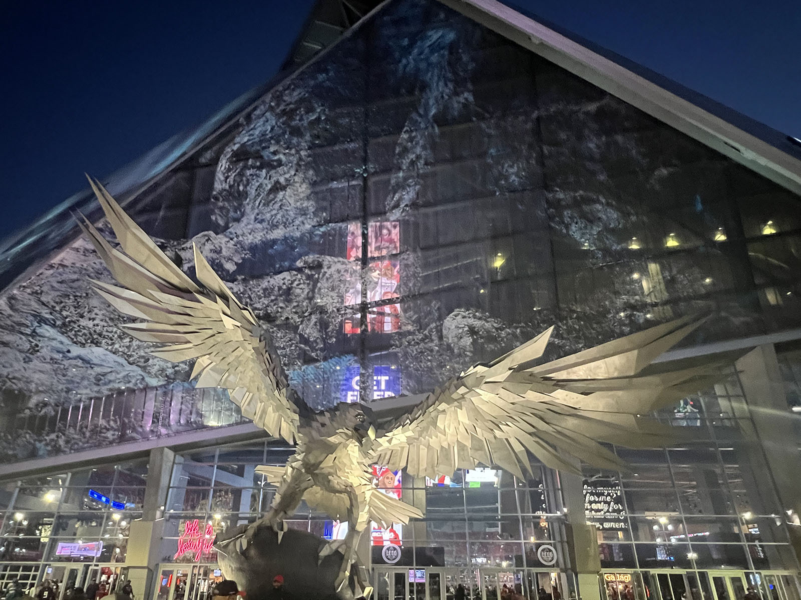 A large falcon statue stands outside Mercedes-Benz Stadium in Atlanta, Georgia