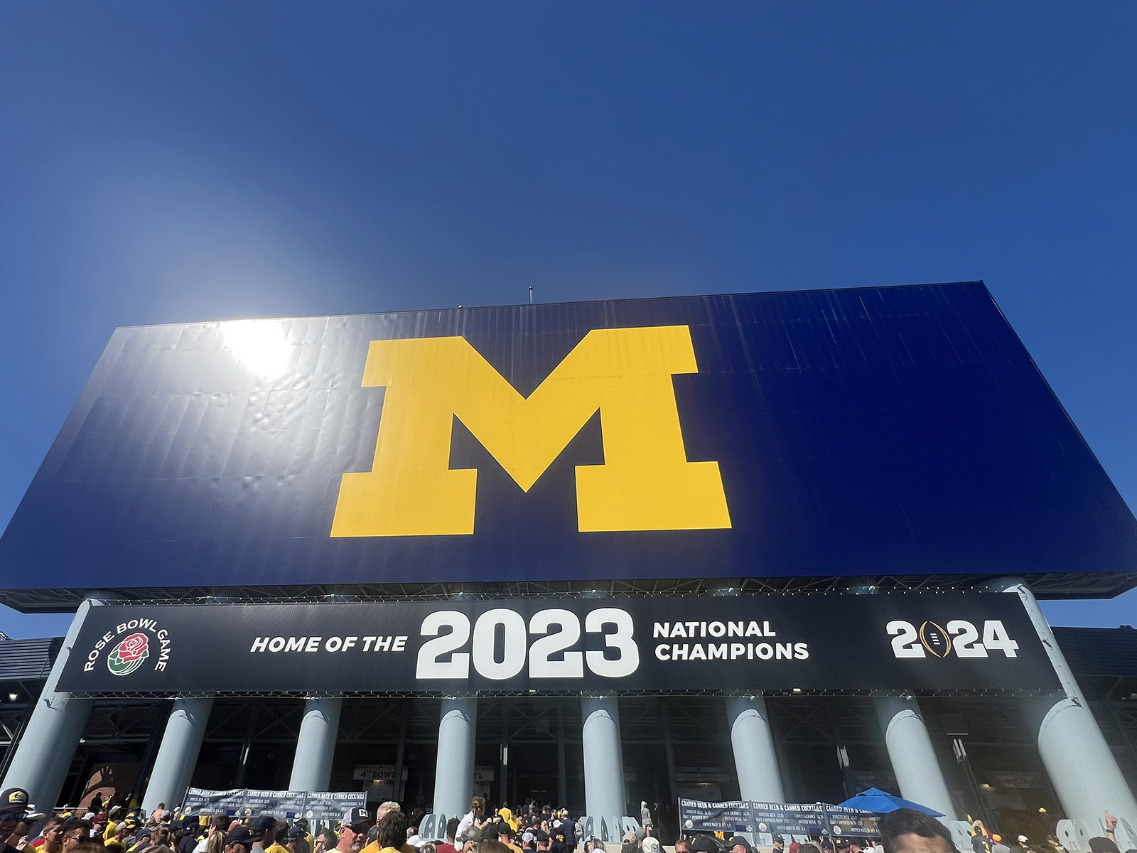 The University of Michigan's block M logo is displayed on the back of the scoreboard at Michigan Stadium