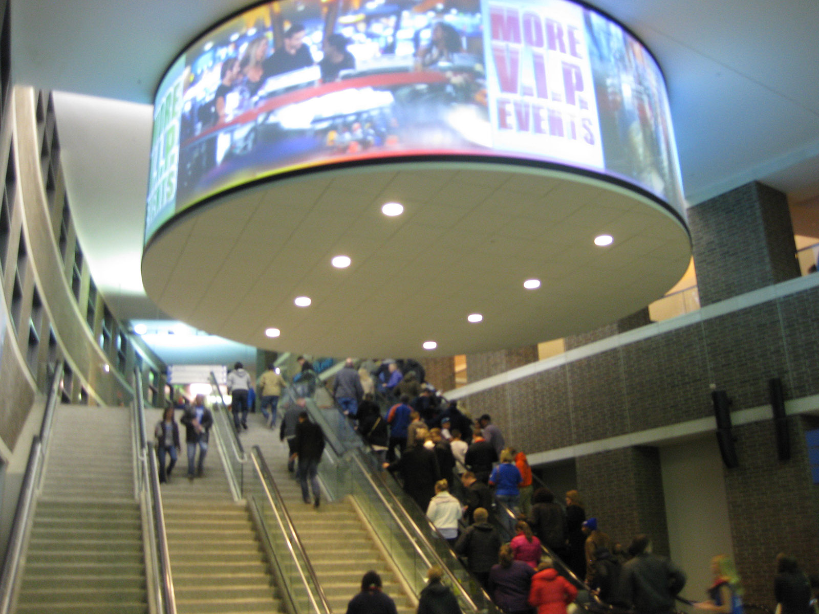 Fans ascend a staircase and escalator prior to a Thunder basketball game at Paycom Center in Oklahoma City, Oklahoma
