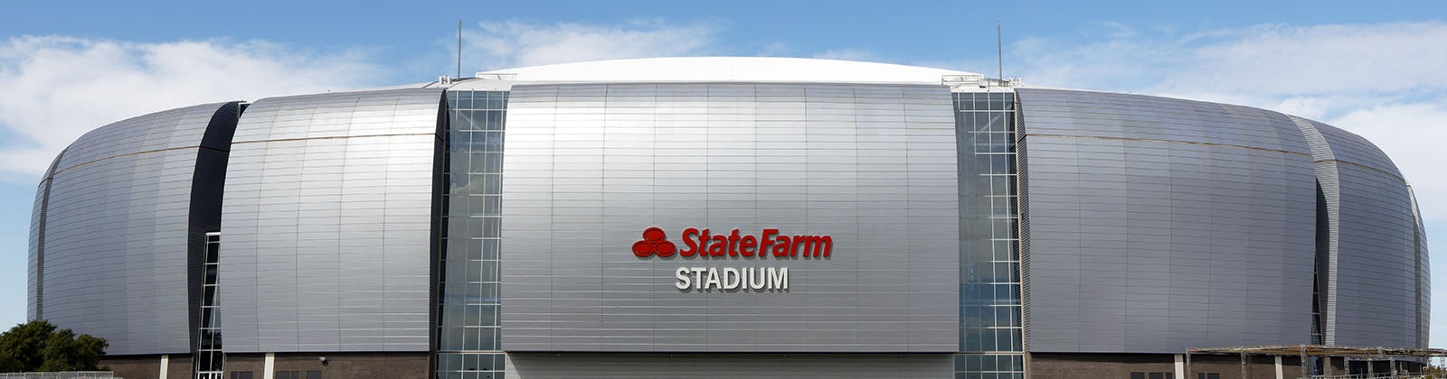 Panoramic view of the exterior of State Farm Stadium in Glendale, Arizona