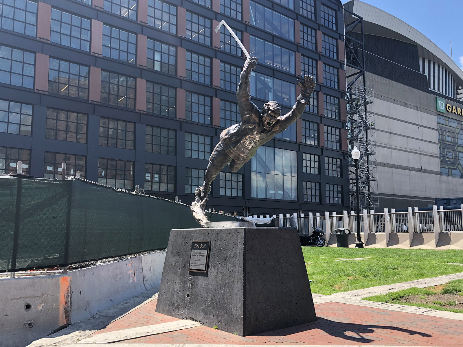 A statue of Bruins legend Bobby Orr stands in front of TD Garden in Boston, Massachusetts