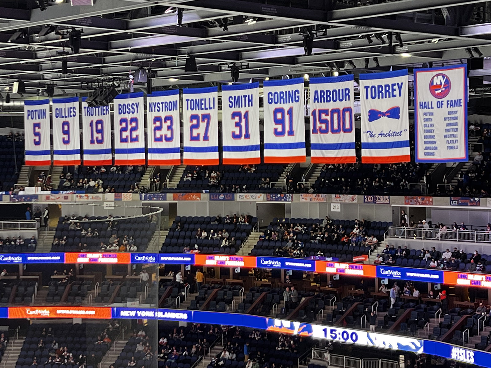 The Islanders' retired numbers hang from the rafters at UBS Arena in Elmont, New York