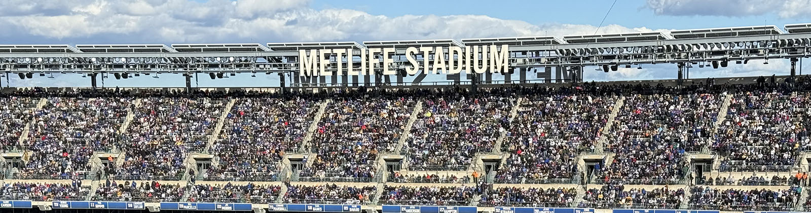 Signage displayed atop the upper façade at MetLife Stadium in East Rutherford, New Jersey