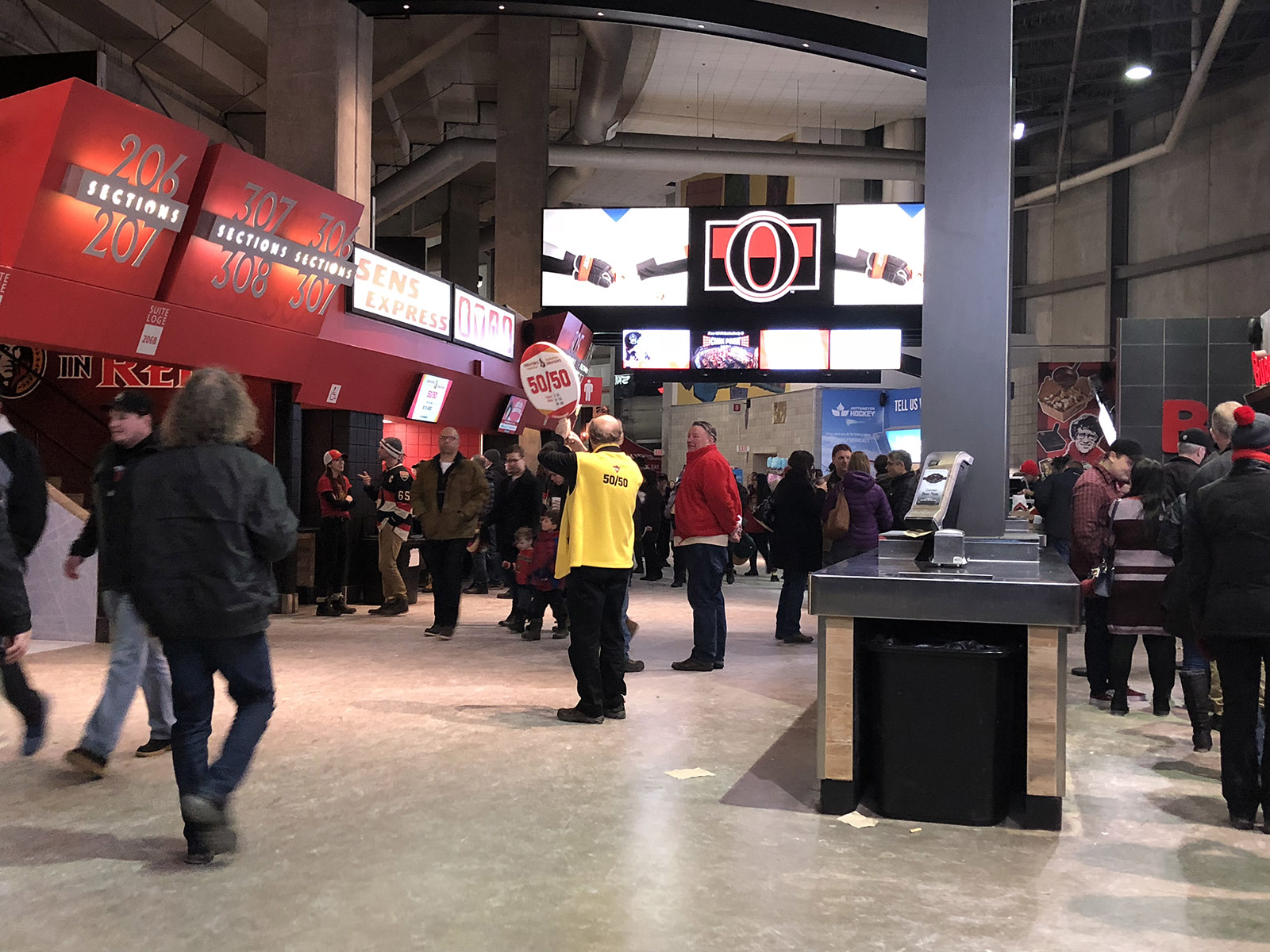 View of patrons walking around the concourse at Canadian Tire Centre in Ottawa, Ontario