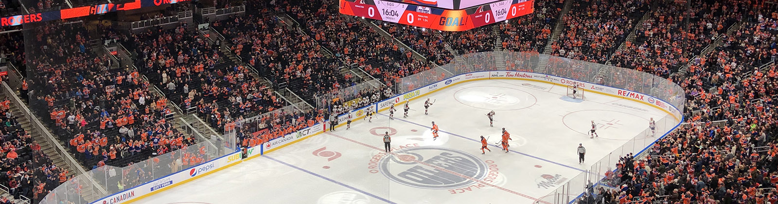 Panoramic view of the rink and seating bowl at Rogers Place in Edmonton, Alberta, during an Oilers hockey game