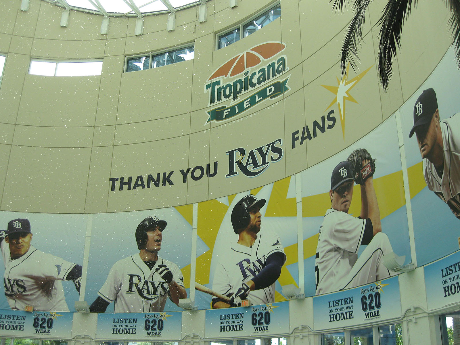 Images of Tampa Bay Rays players are displayed on an entrance atrium at Tropicana Field in St. Petersburg, Florida
