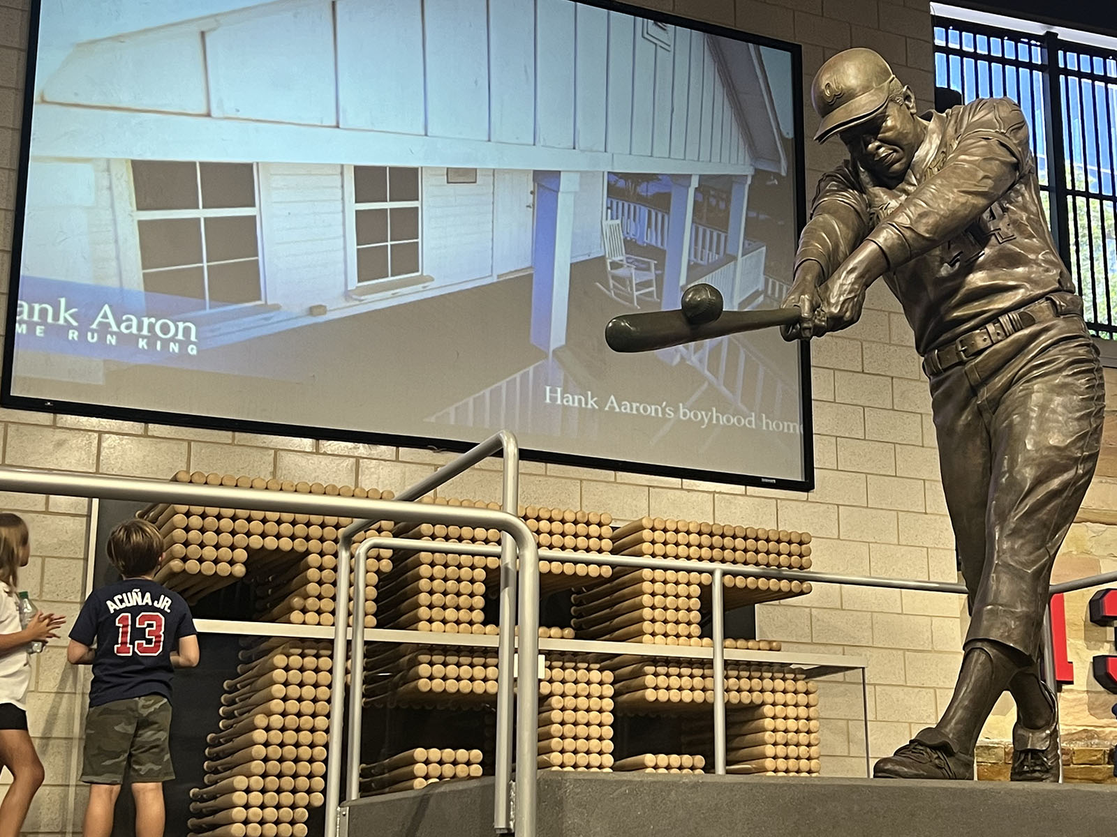 A statue of Hank Aaron is on display on the main concourse at Truist Park in Atlanta, Georgia